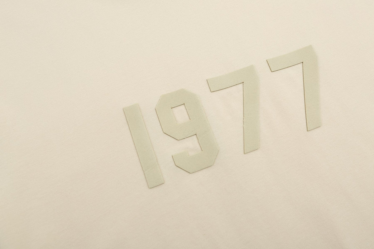 ESSENTIALS 1977 Tonal Wordmark Mock-Neck T-Shirt — detail